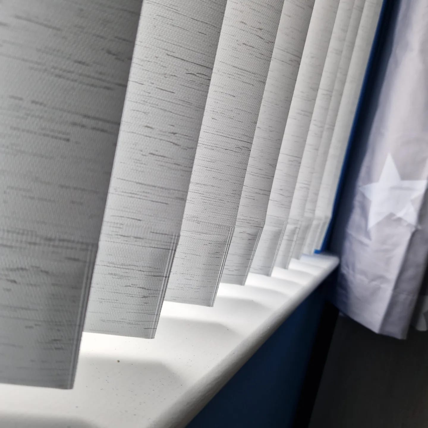 blinds by window curtains